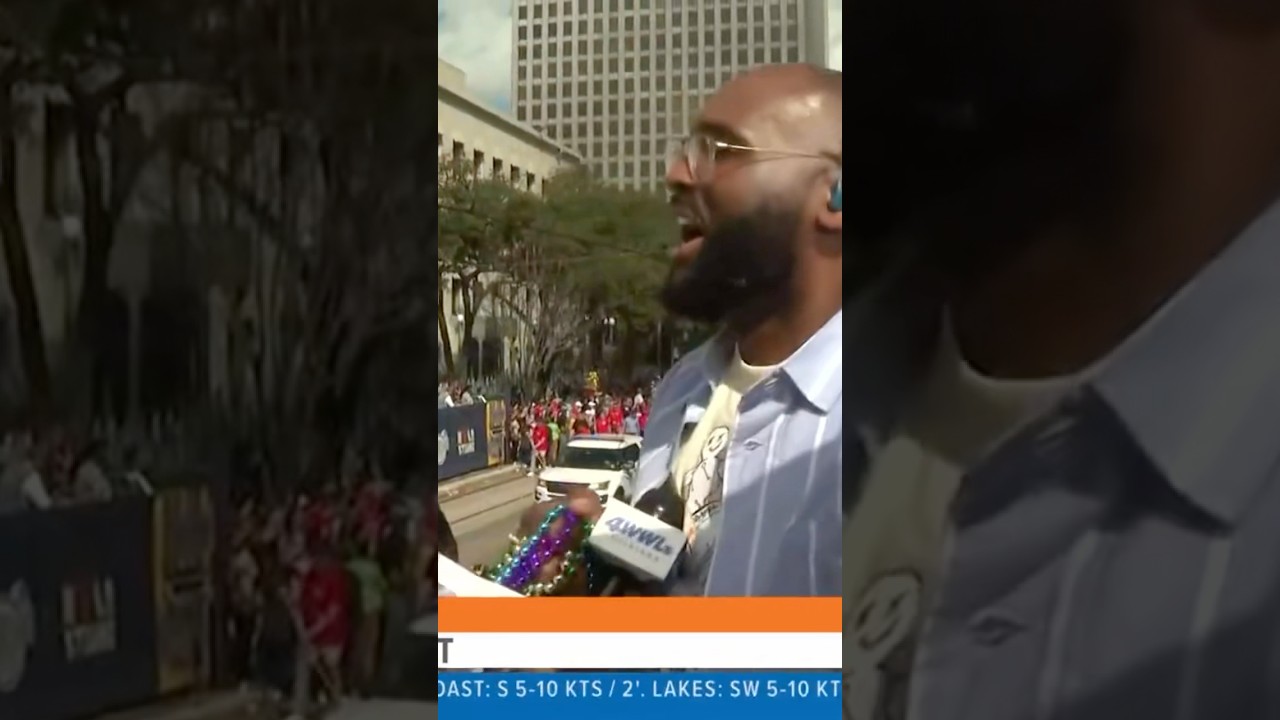 WWL’s Brandon Walker catches a bomb throw at Super Bowl LIX Parade