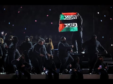 Kendrick Lamar Super Bowl Halftime Show Protester Arrested | Gaza & Sudan Flag Disruption Explained Kendrick Lamar Super Bowl Halftime Show Protester Arrested | Gaza & Sudan Flag Disruption Explained